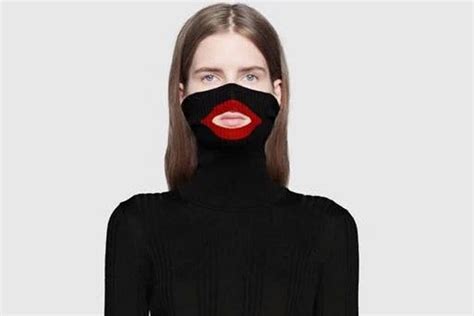 gucci makes black face sweater